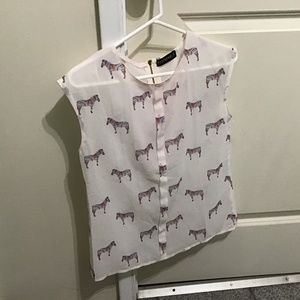 Petite white blouse with  animal  print